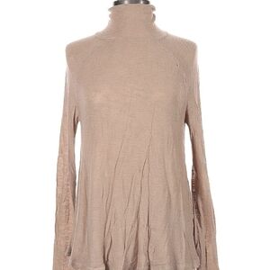 We the free light turtleneck